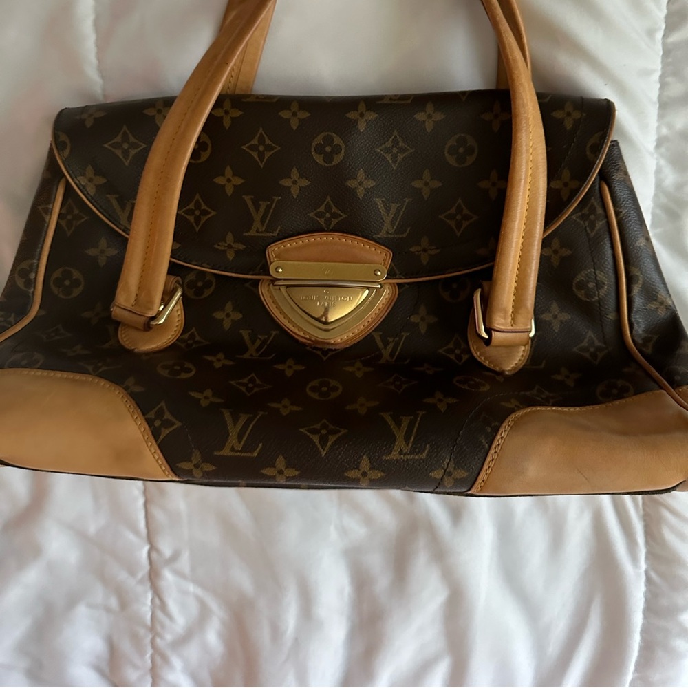 LOUIS VUITTON “BEVERLY GM” $550